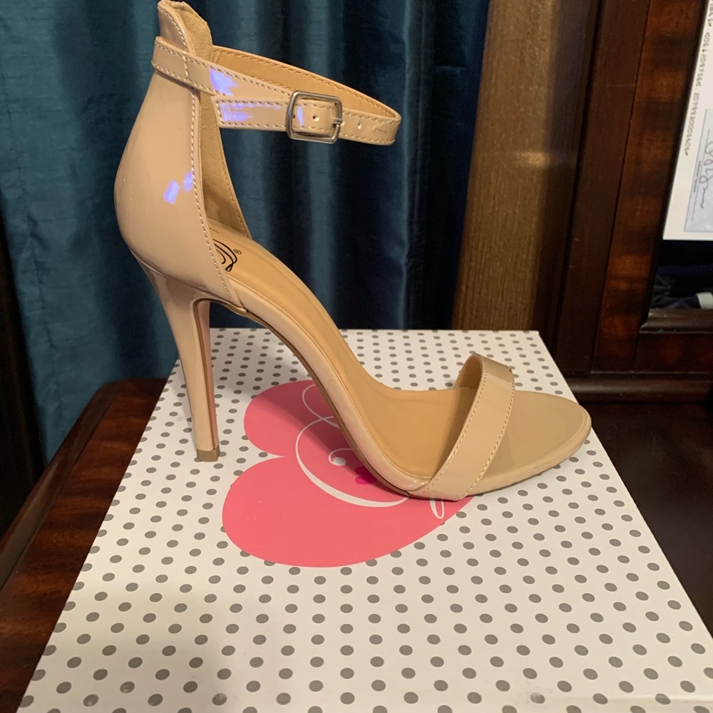 Nude patent leather heels